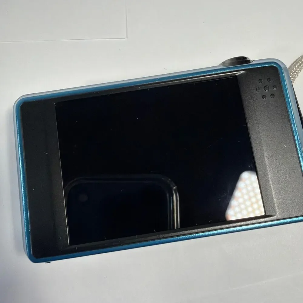 GE E1486TW 14.1MP Blue Digital Camera For Parts SD Card Slot Blocked